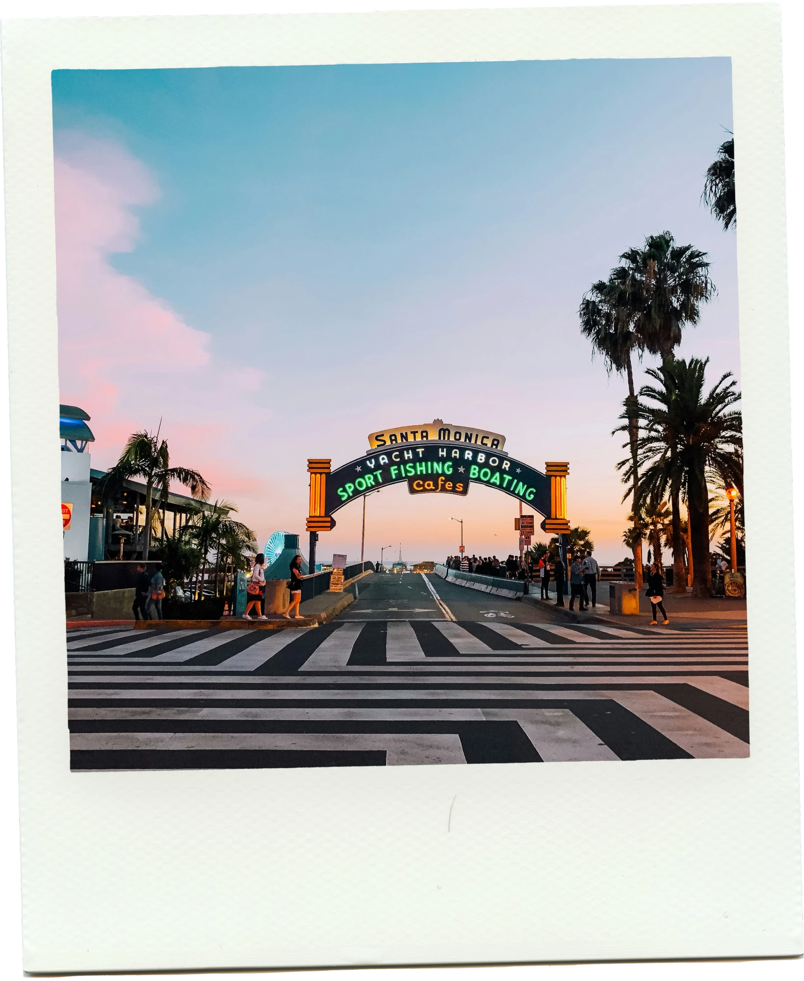 Santa Monica Pier sign at sunset