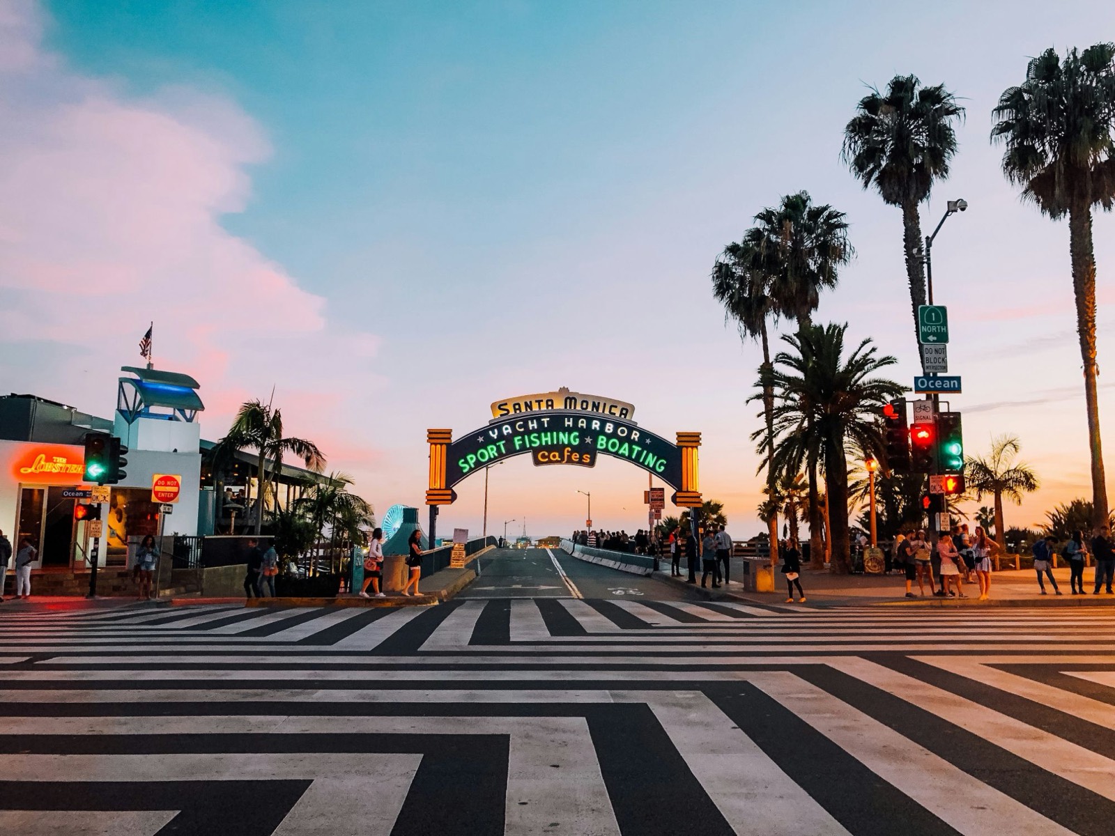 Santa Monica Pier sign at sunset